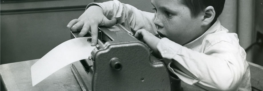 Child using Classic Perkins Brailler